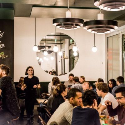 Bustling dining room of Paris restaurant Bal Café Otto.